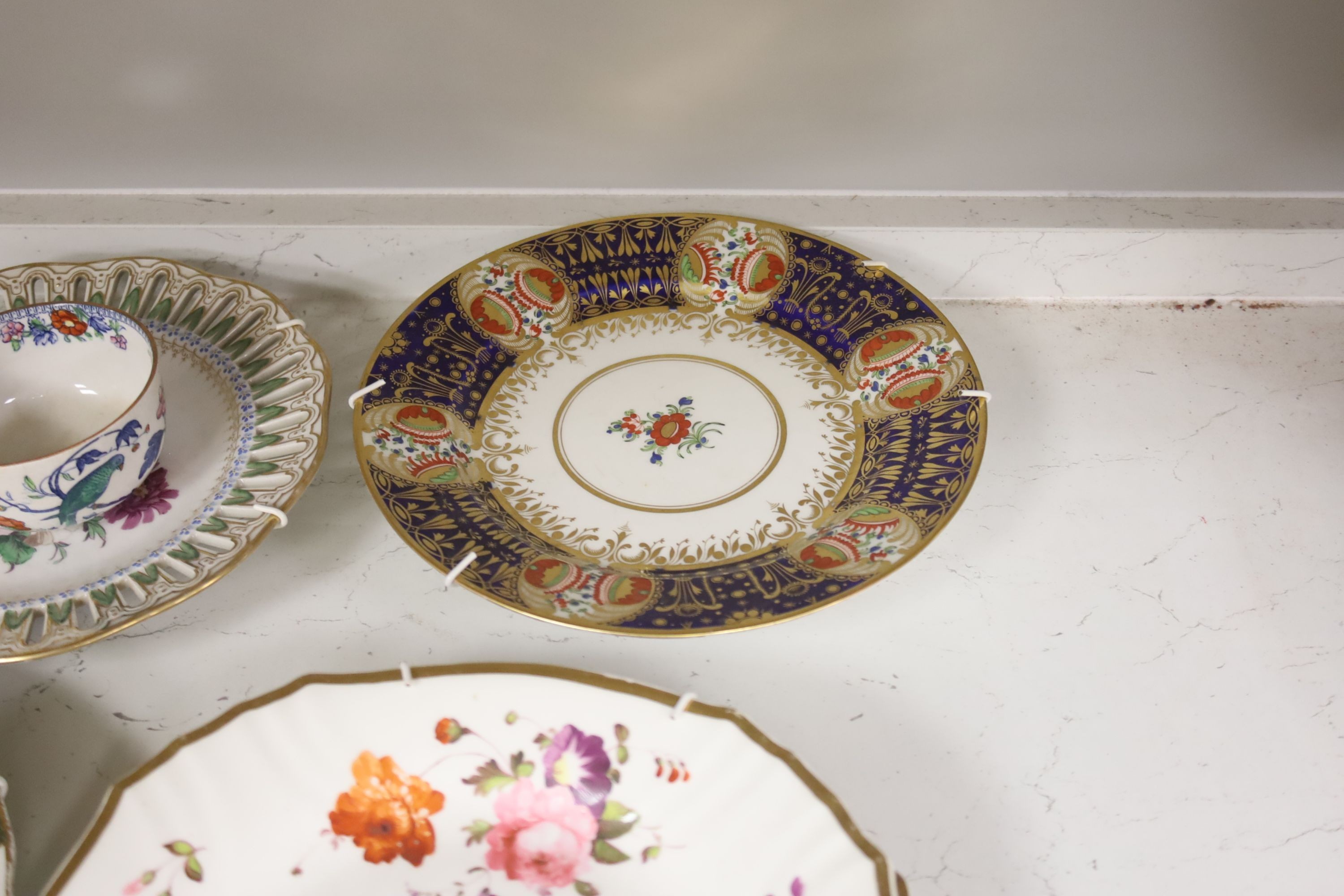 The collection of 19th century English and German porcelain plates, two coffee cups and saucers etc.